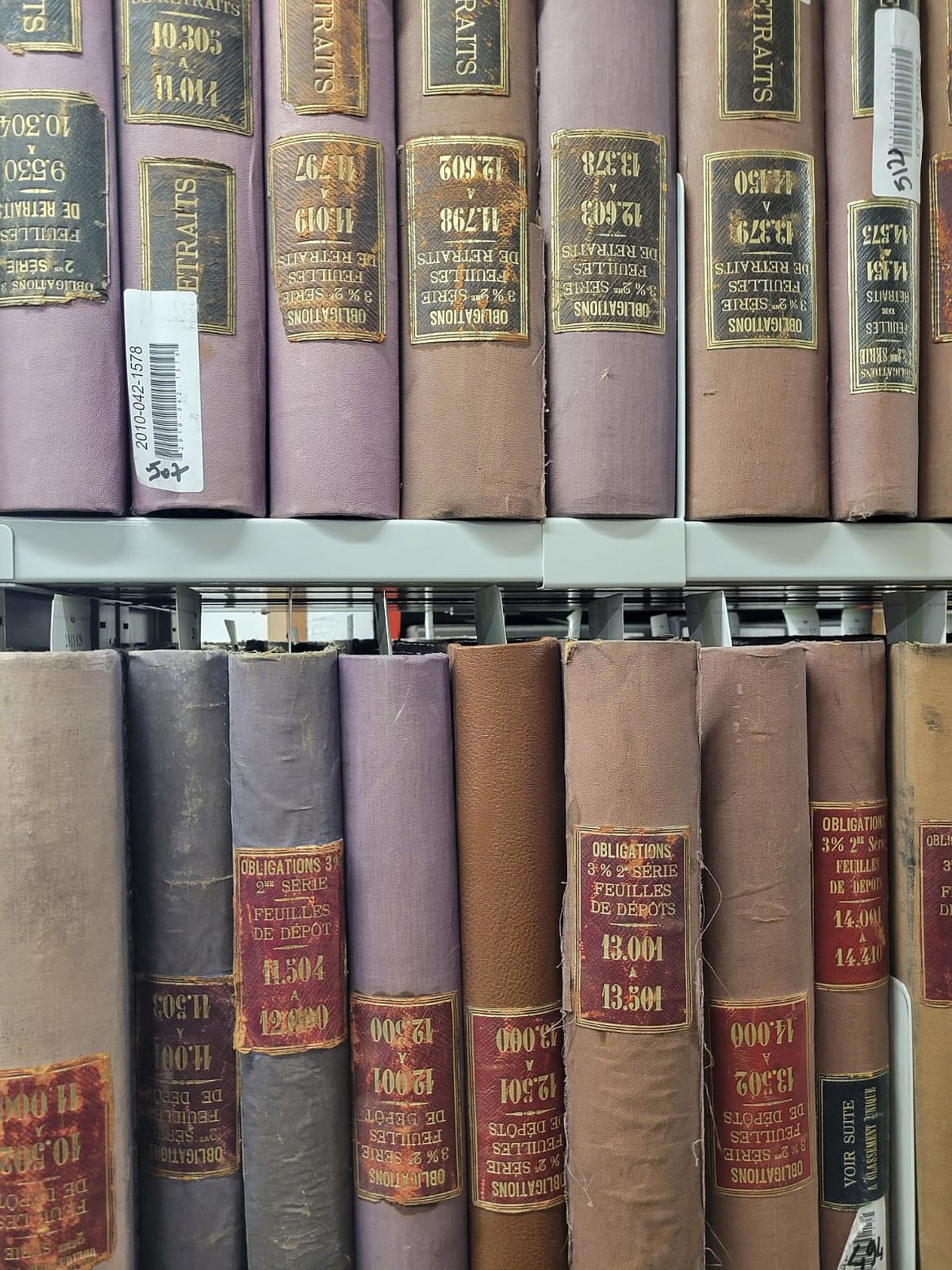 Photo of archived files at the French National Archives of the World of Work